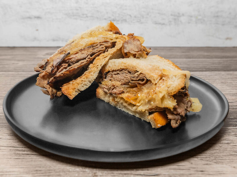Old Man Bill sandwich: hot roast beef, fried onions and melted cheese on a roll